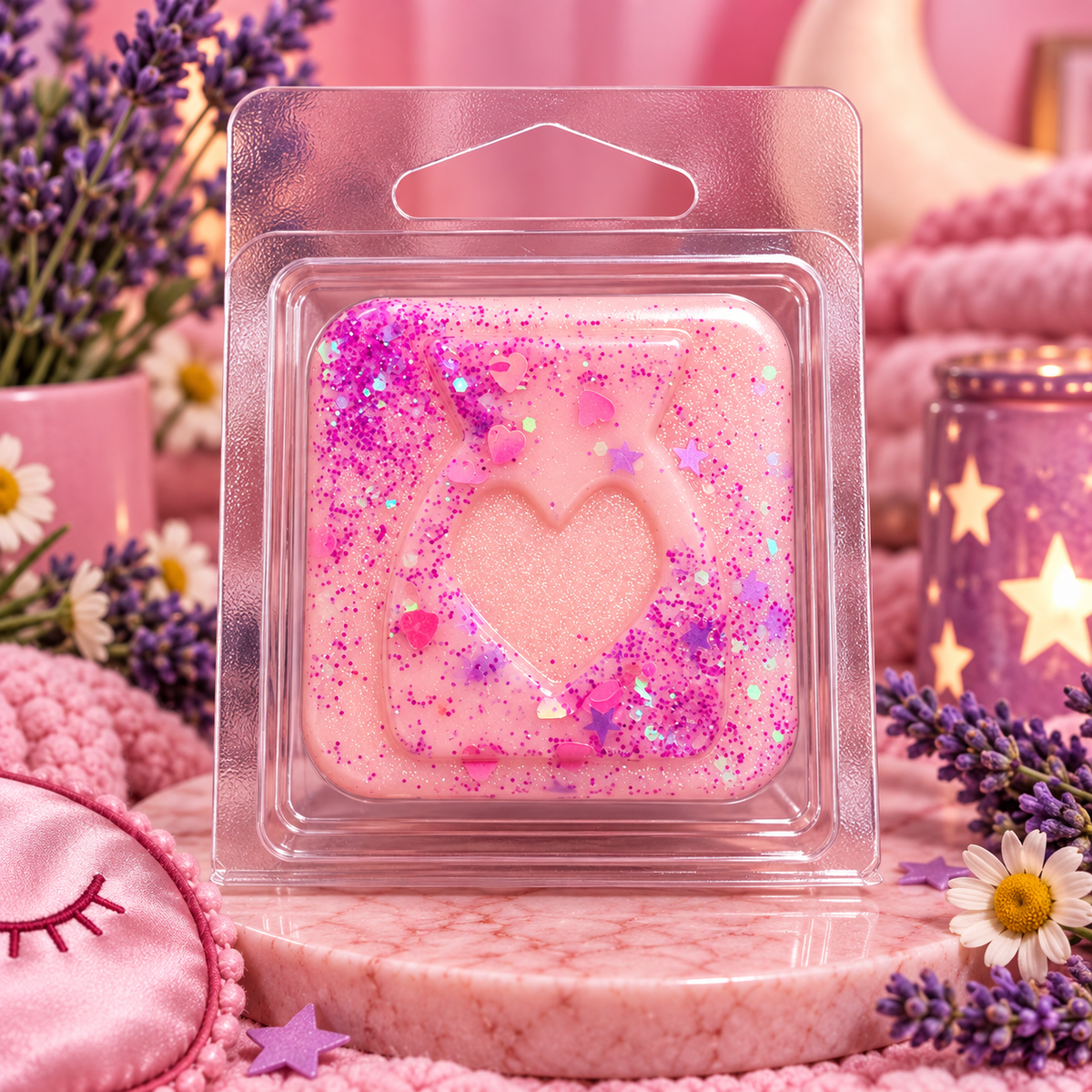 Pink Jammy Time sample wax melt with a heart design and purple flecks beside lavender and cosy decorations.